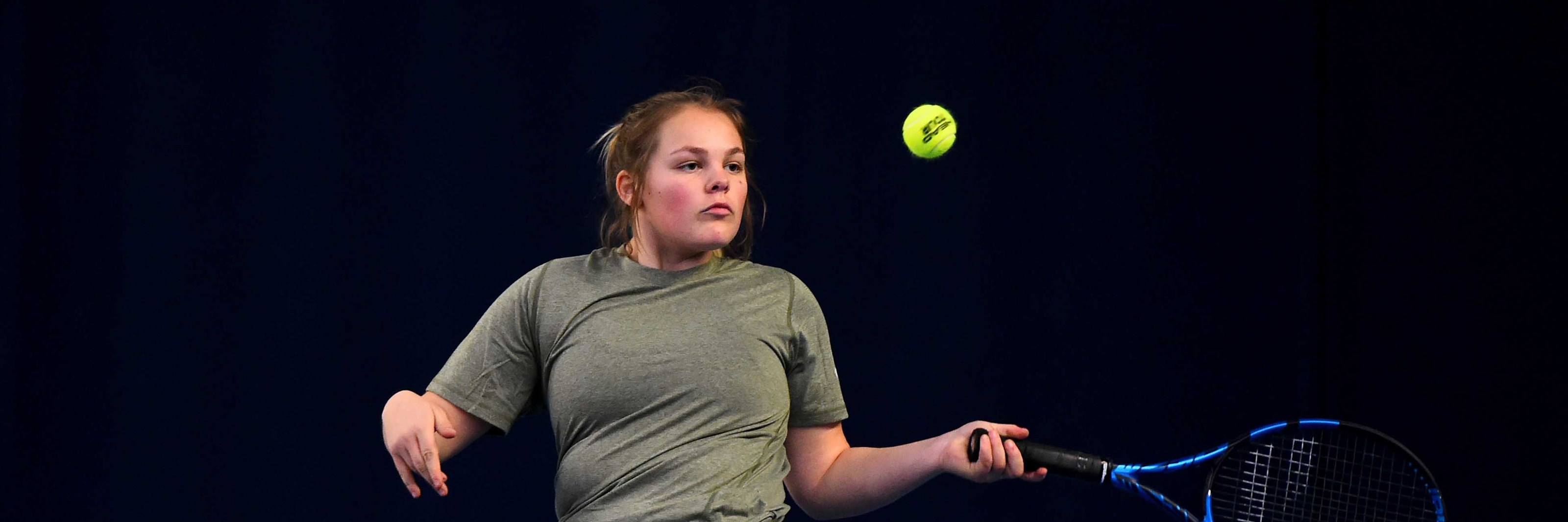 Female tennis player in a wheelchair