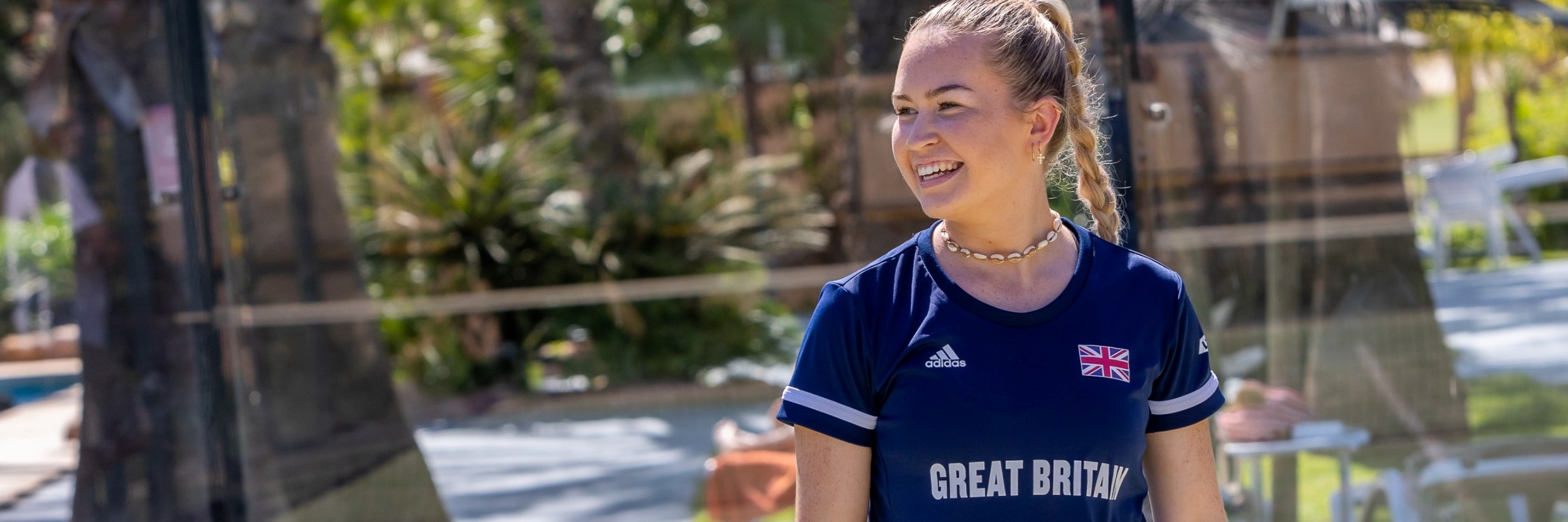 Tia Norton pictured smiling on the Padel Courts 