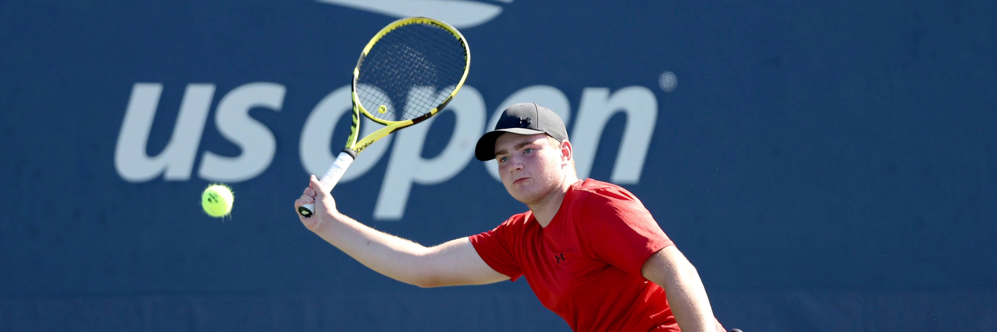 Andrew Penney lines up a forehand at the Junior Wheelchair US Open