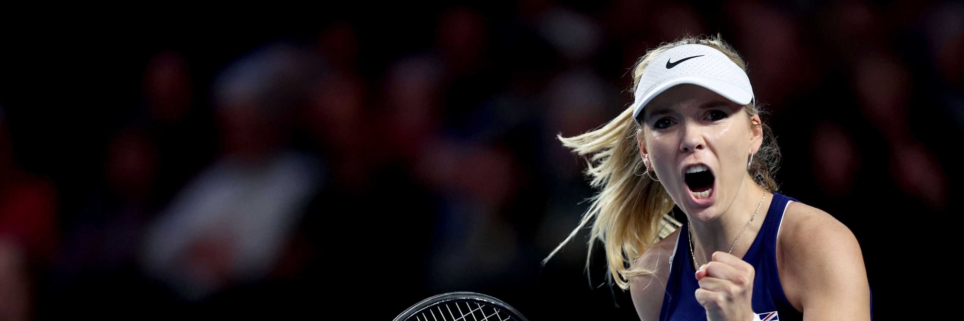 Katie Boulter clenching her fist on court at the Billie Jean King Cup