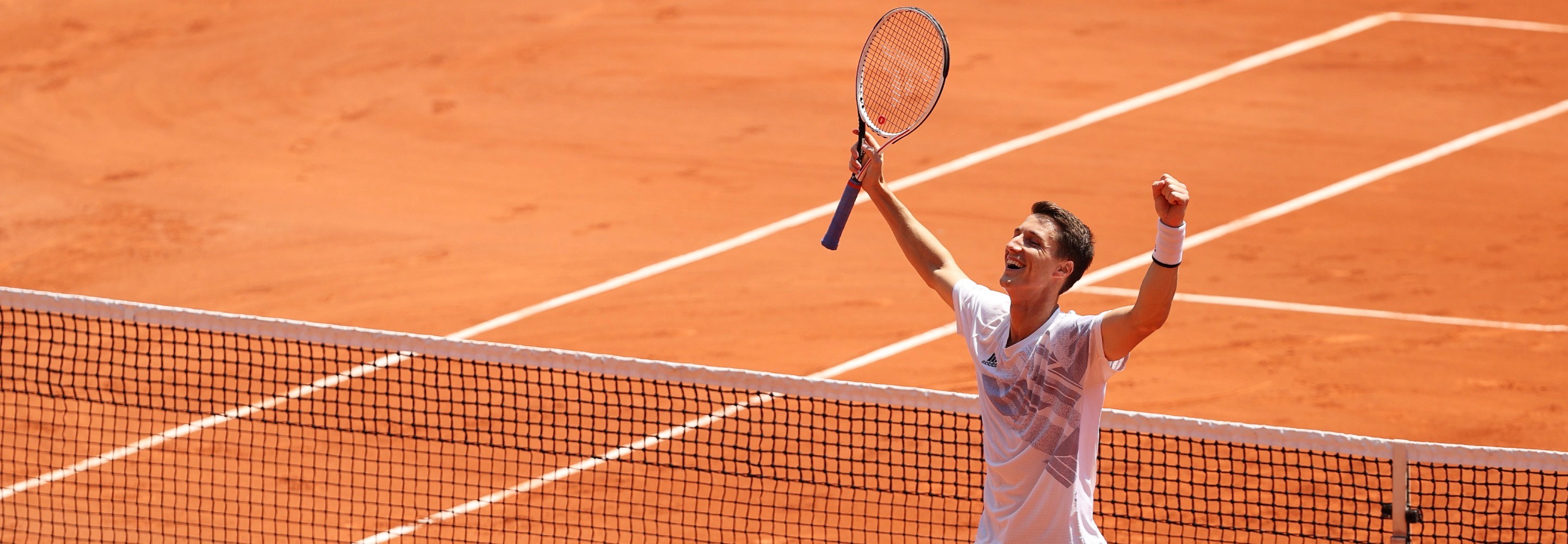 Joe Salisbury of Great Britain celebrates with arms in air