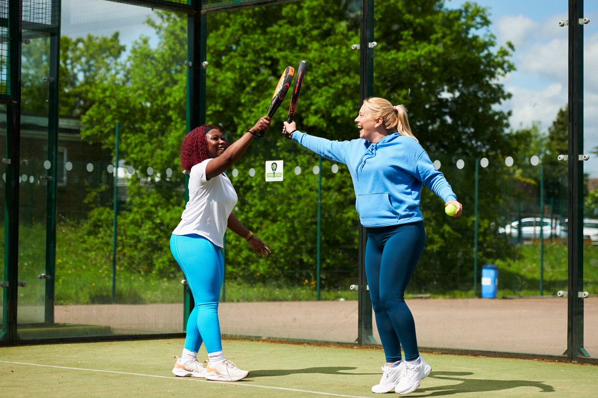 two-players-tapping-padel-rackets.jpg