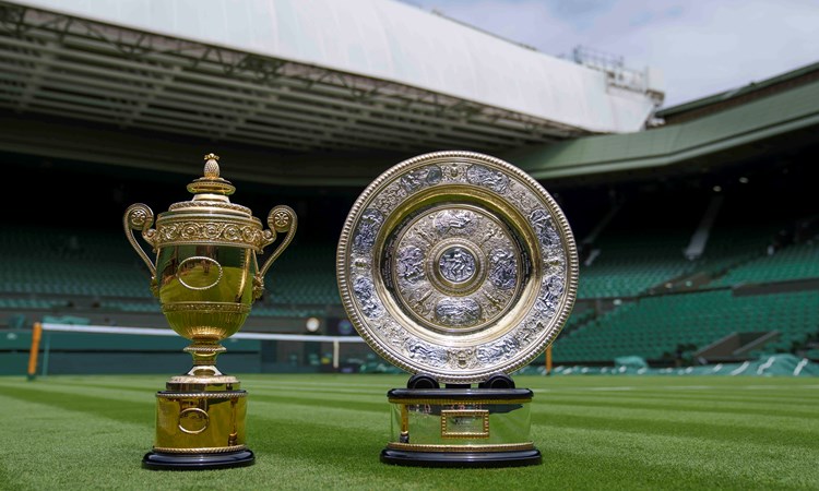 The men's singles and women's singles Wimbledon trophies