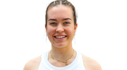 A front-on headshot of British padel player Tia Norton smiling